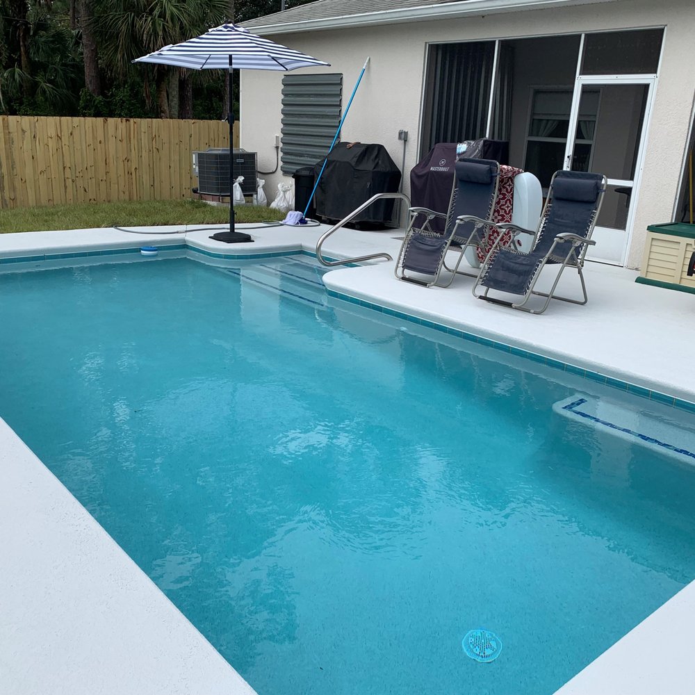 Aqua-Blue Aquatech Pools & Spas - The pool in the daytime. - Pool & Hot Tub Service Near Me - Melbourne, Florida Aqua-Blue Aquatech Pools & Spas - The pool in the daytime. - Pool & Hot Tub Service Near Me - Melbourne, Florida