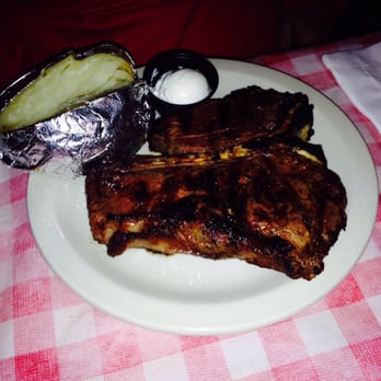 T-Bone Steakhouse - 24 oz porter house with baked potato - Steakhouses Near Me - Phoenix, Arizona T-Bone Steakhouse - 24 oz porter house with baked potato - Steakhouses Near Me - Phoenix, Arizona