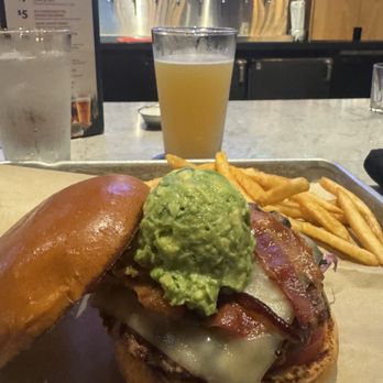 BJ's Restaurant & Brewhouse - Bacon-Guacamole Deluxe Burger* - Pizza Near Me - Torrance, California BJ's Restaurant & Brewhouse - Bacon-Guacamole Deluxe Burger* - Pizza Near Me - Torrance, California