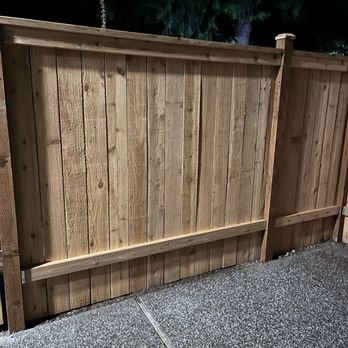 Peak Renovations - Inside view of cedar fence. - General Contractors Near Me