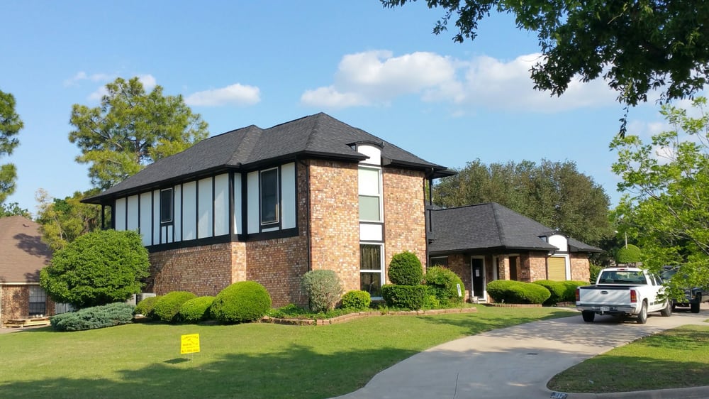 Slide of Tomahawk Roofing Company