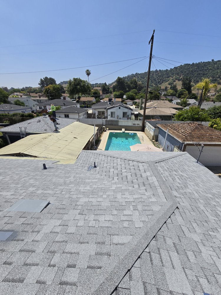 Slide of Eminent Roofing