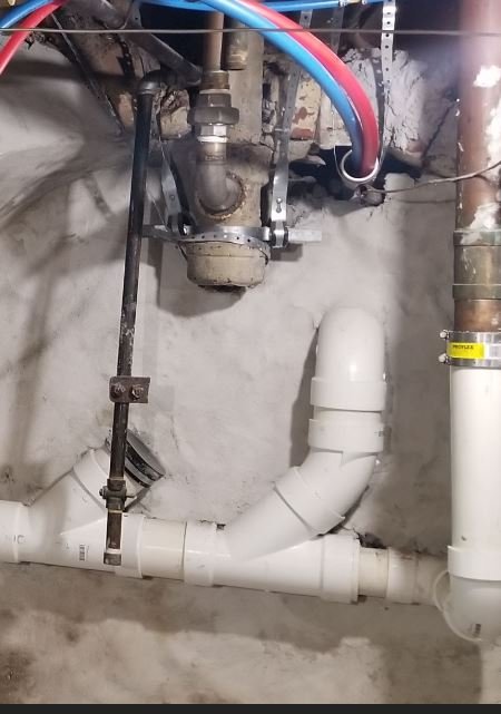 Slide of Plumbing Drain and Tile Master