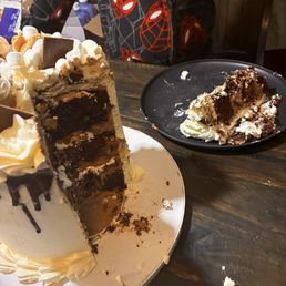 Chocolate s'mores cake with Nutella, fluff, marshmallow fluff, Dubai, chocolate, Granham, crackers, and toasted marshmallow icing