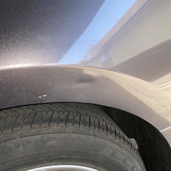 Finesse Pros - Side view of the dent on the back - Mobile Dent Repair Near Me Finesse Pros - Side view of the dent on the back - Mobile Dent Repair Near Me