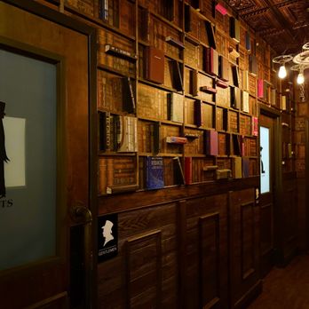 Jekyll and Hyde Taphouse Grill - Wall of books leading to bathroom - Bars Near Me - Matthews, North Carolina Jekyll and Hyde Taphouse Grill - Wall of books leading to bathroom - Bars Near Me - Matthews, North Carolina