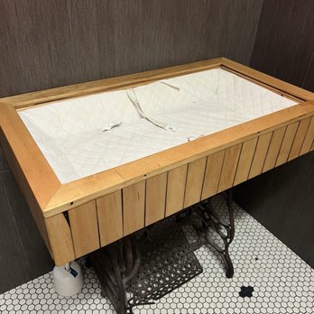 Thai Pop - Bathroom baby changing table - a very nice touch, better than many of the plastic changing tables you see in other places - Thai Near Me - Rochester, Minnesota