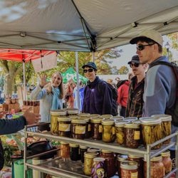 Memorial Centre Farmers' Market - A 100% Producer-run market means vendors sell only what they produce! Seen here: Caught Winding Path Farms mid-conversation!