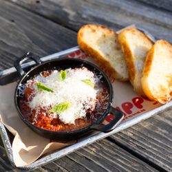 Tripping Animals Taproom - Oakland Park - Homemade meatballs in marinara sauce with ricotta cream and Parmigiano Reggiano.