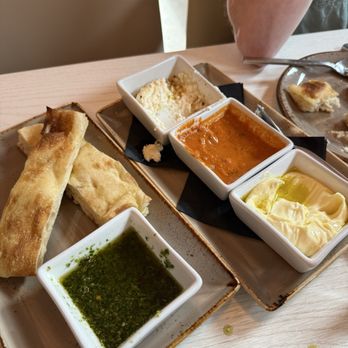 Jay Luigi - Bread sticks with ricotta and honey, vodka sauce, butter, pesto house sauce. - Pizza Near Me - Tampa, Florida Jay Luigi - Bread sticks with ricotta and honey, vodka sauce, butter, pesto house sauce. - Pizza Near Me - Tampa, Florida