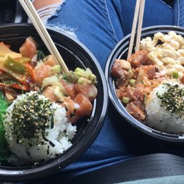 (Left to right) Kamano Bowl, white rice, squid salad and seaweed salad & Pele's Fire Bowl (right), white rice, squid salad and crazy mac (Left to right) Kamano Bowl, white rice, squid salad and seaweed salad & Pele's Fire Bowl (right), white rice, squid salad and crazy mac