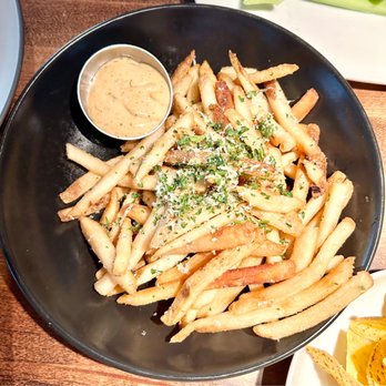 Cactus Club Cafe - Truffle Fries (one of our favorites, especially with that amazing garlic aioli dip) - July 2023 - Canadian (New) Near Me - Langley, British Columbia Cactus Club Cafe - Truffle Fries (one of our favorites, especially with that amazing garlic aioli dip) - July 2023 - Canadian (New) Near Me - Langley, British Columbia