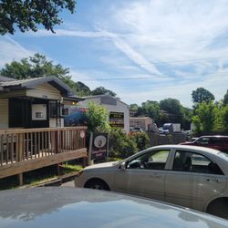 Roebuck Shopping Center - Illegal towing cost us $ 1175.00 to get it out signs faced down on parking lot a bunch of crooked people.
