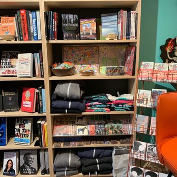 Lion's Tooth - Shirts and stickers - Bookstores Near Me - Milwaukee, Wisconsin