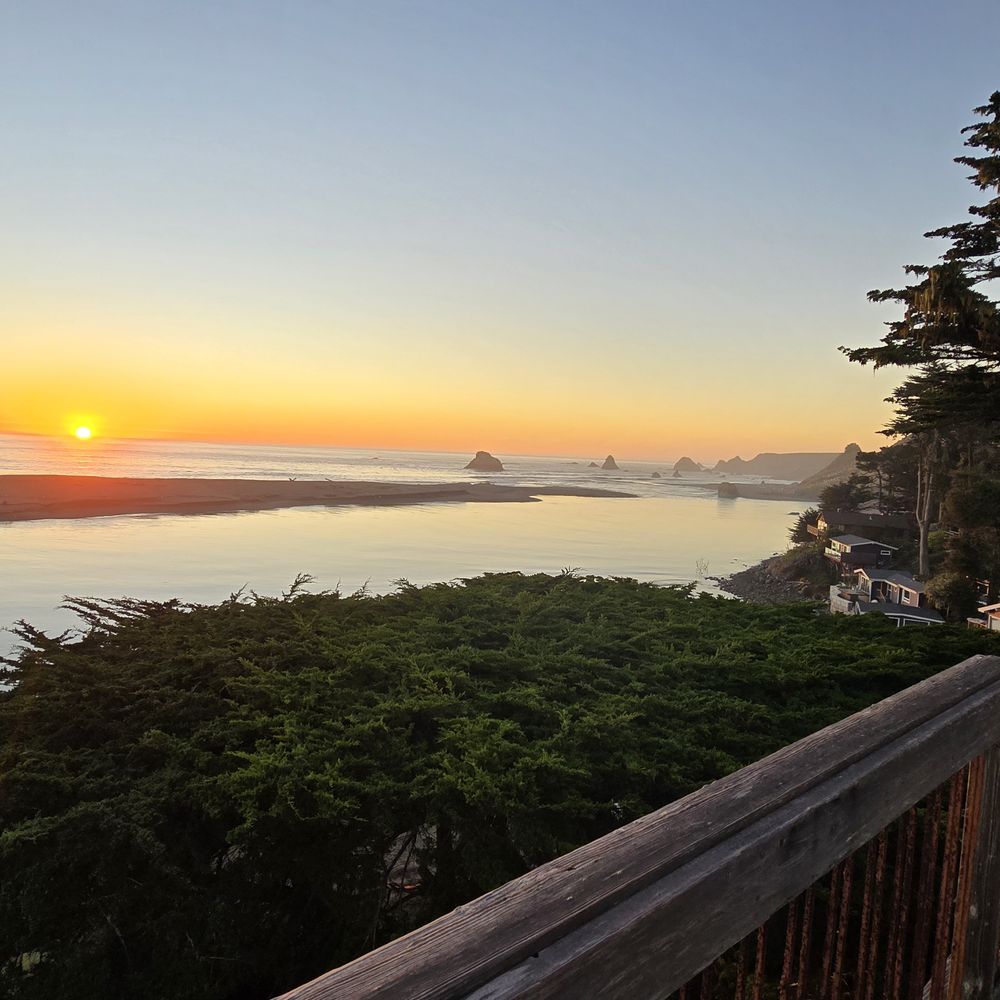 View from deck with river and ocean during sunset View from deck with river and ocean during sunset