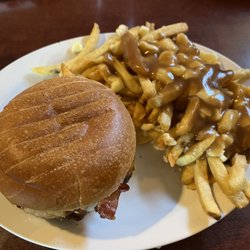 Holy Cow - Smokehouse Burger with an upgrade of Poutine fries. Very tasty. Fresh Ground Beef and fresh local potatoes hand cut into fries.