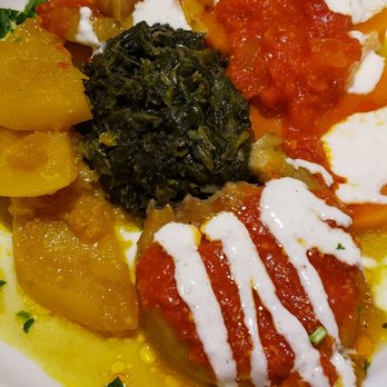 Samira Restaurant - Namounna sampler w/ spinach and baked turnip, butternut squash, and eggplant covered in a spicy tomato sauce and yogurt dressing. - Afghan Near Me - Bloomington, Indiana Samira Restaurant - Namounna sampler w/ spinach and baked turnip, butternut squash, and eggplant covered in a spicy tomato sauce and yogurt dressing. - Afghan Near Me - Bloomington, Indiana
