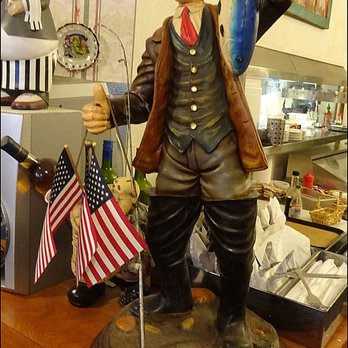 Pelican's Roost Fish & Chips - This guy, along with a few patriotic flags, welcomes you to the restaurant. The decor is pure vintage and nostalgia. - Seafood Near Me - Auburn, California Pelican's Roost Fish & Chips - This guy, along with a few patriotic flags, welcomes you to the restaurant. The decor is pure vintage and nostalgia. - Seafood Near Me - Auburn, California