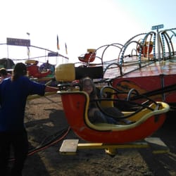 Red River Valley Fair Association - Here's my neice & son on the ride & the guy standing next to them is the guy who spun them & laughed with the guy controlling it