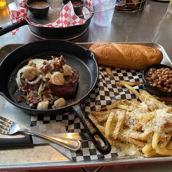 Sanford's Grub & Pub - Garlic Parmesan Fries, black eyed peas and a great steak with blue cheese crumbs and onions YUM!! - American Near Me - Cheyenne, Wyoming