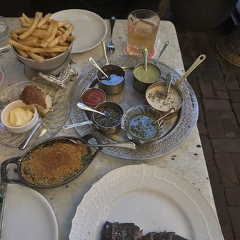 Sunny's Steakhouse - Hanger steak, fries, creamed spinach, sauce party!! - Cocktail Bars Near Me - Miami, Florida