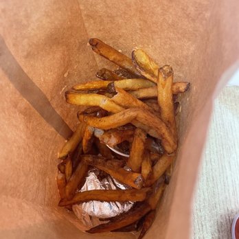 Five Guys - Classic down bag shot of 9 lbs of fries. - Burgers Near Me - Memphis, Tennessee Five Guys - Classic down bag shot of 9 lbs of fries. - Burgers Near Me - Memphis, Tennessee