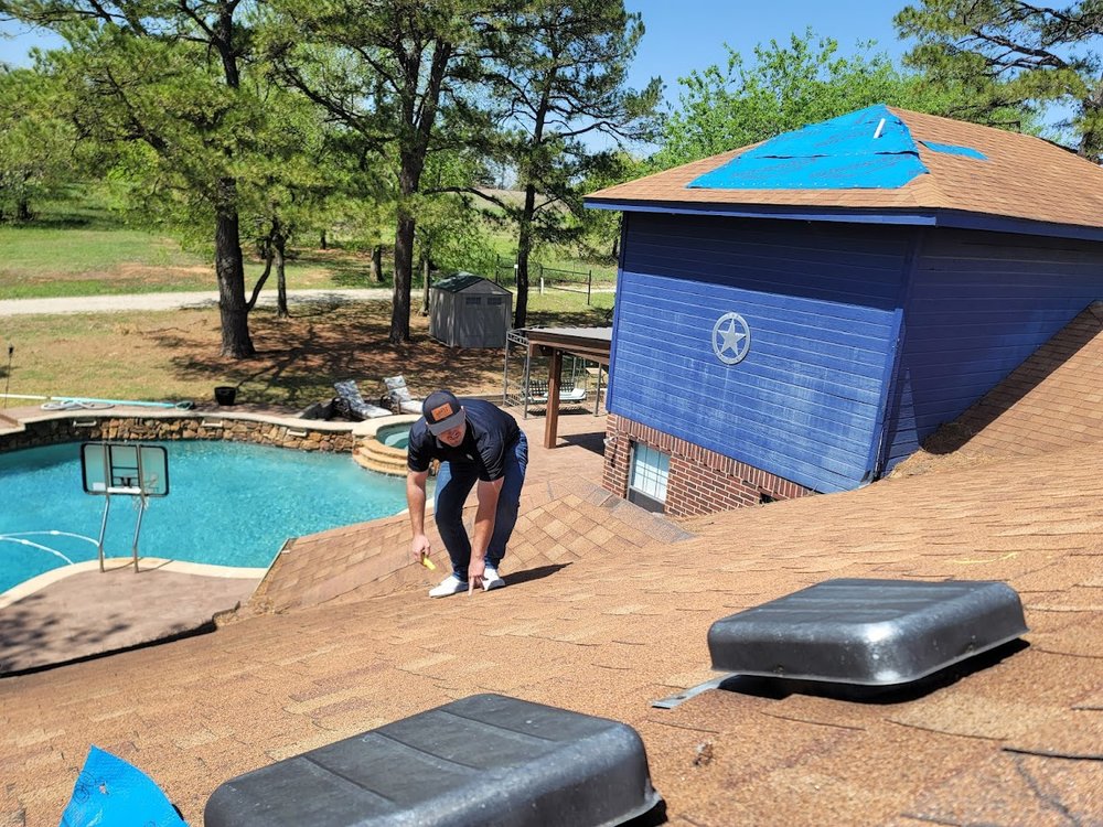 Slide of Nailed It Roofing and Construction