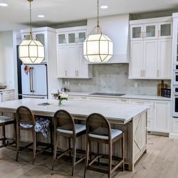 Nine Mile Cabinetry - Custom white uppers paired with a stunning weathered wood island. Luxury craftsmanship by Nine Mile Cabinetry. Message us for a quote!