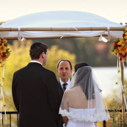Laughing Lady Flower Farm - Bamboo chuppah with lilies and dahlias