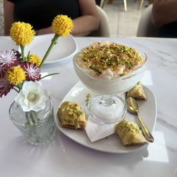 Rice pudding and Baklava on the house from our wonderful server Rice pudding and Baklava on the house from our wonderful server