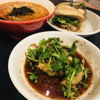 Mecha Noodle Bar - Red oil dumplings with a banh mi and spicy miso ramen in the back! - Noodles Near Me - New Haven, Connecticut Mecha Noodle Bar - Red oil dumplings with a banh mi and spicy miso ramen in the back! - Noodles Near Me - New Haven, Connecticut