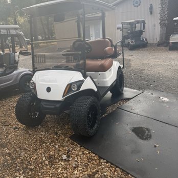 JJ Golf Carts - Custom golf cart with phone chargers, lights, Bluetooth, rugged tires, seatbelts, leather seats, foldable rear seats,etc - Golf Cart Rentals Near Me - Lady Lake, Florida JJ Golf Carts - Custom golf cart with phone chargers, lights, Bluetooth, rugged tires, seatbelts, leather seats, foldable rear seats,etc - Golf Cart Rentals Near Me - Lady Lake, Florida