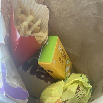 McDonald's - a hand grabbing a bag of fries - Fast Food Near Me - Cedar Falls, Iowa