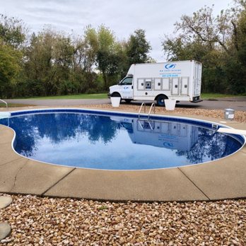 MN Pool Rescue - A brand new liner we installed  backed by our service vehicle - Pool & Hot Tub Service Near Me - White Bear Lake, Minnesota