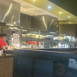These women are on there phone also chatting. I got the wrong order and also the drink machines are empty where they could be doing jobs These women are on there phone also chatting. I got the wrong order and also the drink machines are empty where they could be doing jobs