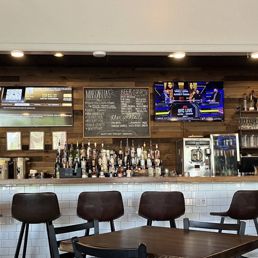 Local Taco - a bar with several chairs and a television - Mexican Near Me - Bowling Green, Kentucky Local Taco - a bar with several chairs and a television - Mexican Near Me - Bowling Green, Kentucky