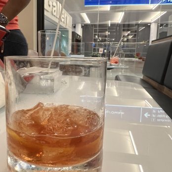 Escape Lounges - Old fashion (he started drinking it before I took a picture) - Airport Lounges Near Me - Phoenix, Arizona Escape Lounges - Old fashion (he started drinking it before I took a picture) - Airport Lounges Near Me - Phoenix, Arizona