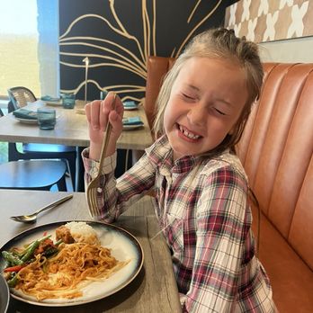 Blue Orchid Thai Kitchen - Happy kiddo with chicken pad Thai - Thai Near Me - Las Vegas, Nevada Blue Orchid Thai Kitchen - Happy kiddo with chicken pad Thai - Thai Near Me - Las Vegas, Nevada