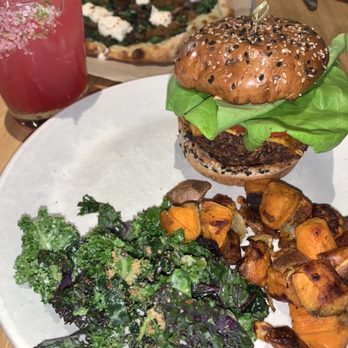 True Food Kitchen - Double Vegan Cheeseburger with Sweet Potato Hash and Kale Cesar Salad - New American Near Me - Boca Raton, Florida True Food Kitchen - Double Vegan Cheeseburger with Sweet Potato Hash and Kale Cesar Salad - New American Near Me - Boca Raton, Florida