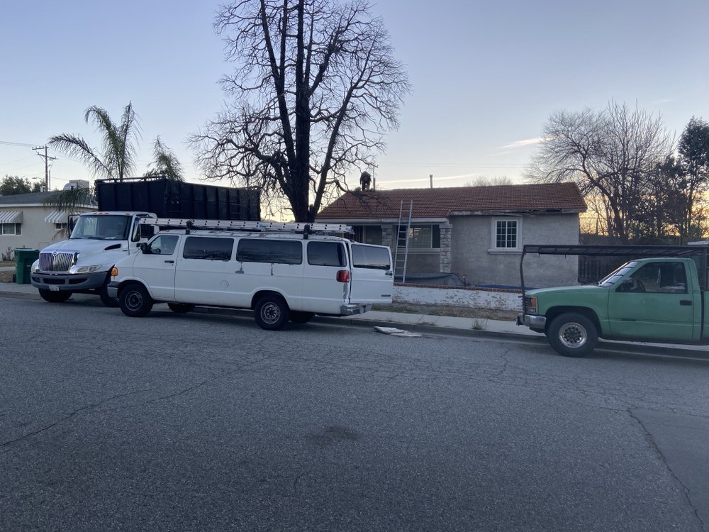 Slide of MRK Roofing Services