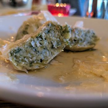 Tesoro - Cross section. Ricotta Gnudi with spinach, brown butter, Parmigiano Reggiano. $17. - Italian Near Me - Carrboro, North Carolina Tesoro - Cross section. Ricotta Gnudi with spinach, brown butter, Parmigiano Reggiano. $17. - Italian Near Me - Carrboro, North Carolina