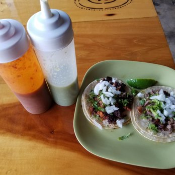 El Come Taco - Is that two bottles of salsa in your pockets or are you two guys just really pleased to see me eating your girlfriend's tacos? - Mexican Near Me - Dallas, Texas