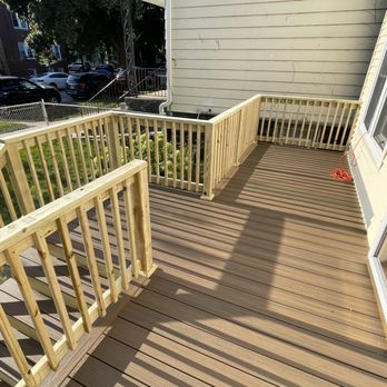 Jep Construction - After, with Trex decking and wood railing - General Contractors Near Me