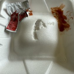 Indys Burger Joint - Styrofoam box melted onto food.