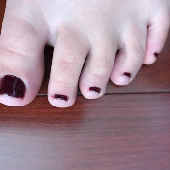 Soak Nails - Polish chipping on big toe less than a day after. Uneven cutting/filing. Got polish on the skin around the nail was not cleaned up. - Nail Salons Near Me - Encino, California