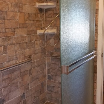 TGCI Construction - a shower with a glass door - General Contractors Near Me TGCI Construction - a shower with a glass door - General Contractors Near Me
