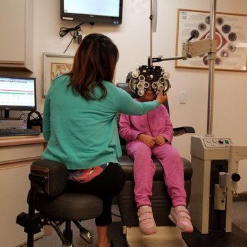 San Bruno Eye Care Center - My daughter getting her eyes checked by Dr. Connie. - Optometrists Near Me - San Bruno, California San Bruno Eye Care Center - My daughter getting her eyes checked by Dr. Connie. - Optometrists Near Me - San Bruno, California