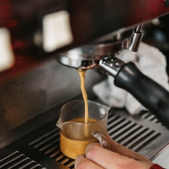 Wild Things Coffee - a person pouring a cup of coffee - Coffee & Tea Near Me - Meridian, Idaho Wild Things Coffee - a person pouring a cup of coffee - Coffee & Tea Near Me - Meridian, Idaho