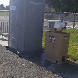 Meridian Elementary School - Outhouse and handwashing station for the summer. Pretty cool