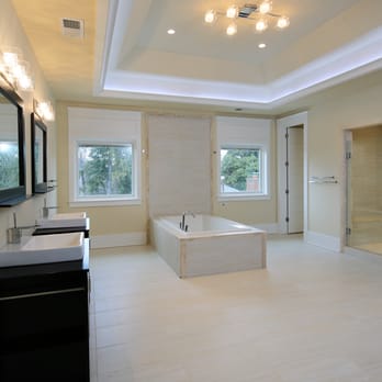 CCDC International - a large bathroom with a walk in shower - General Contractors Near Me CCDC International - a large bathroom with a walk in shower - General Contractors Near Me